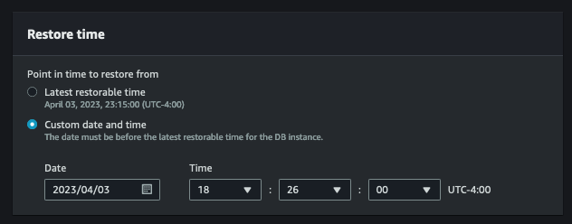 AWS RDS "Point in Time" Recovery window. It gives the user two options: one to restore from the latest point in time available, the other to restore from a specific point in time, including date, hour and min ute fields.